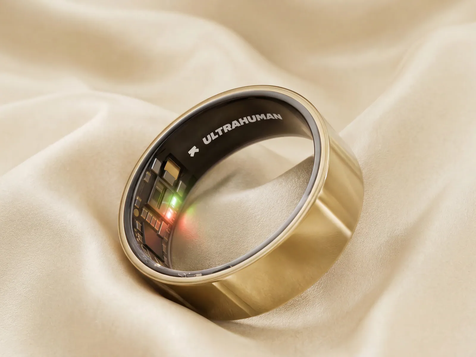 Gold Ultrahuman Ring AIR with visible interior sensors